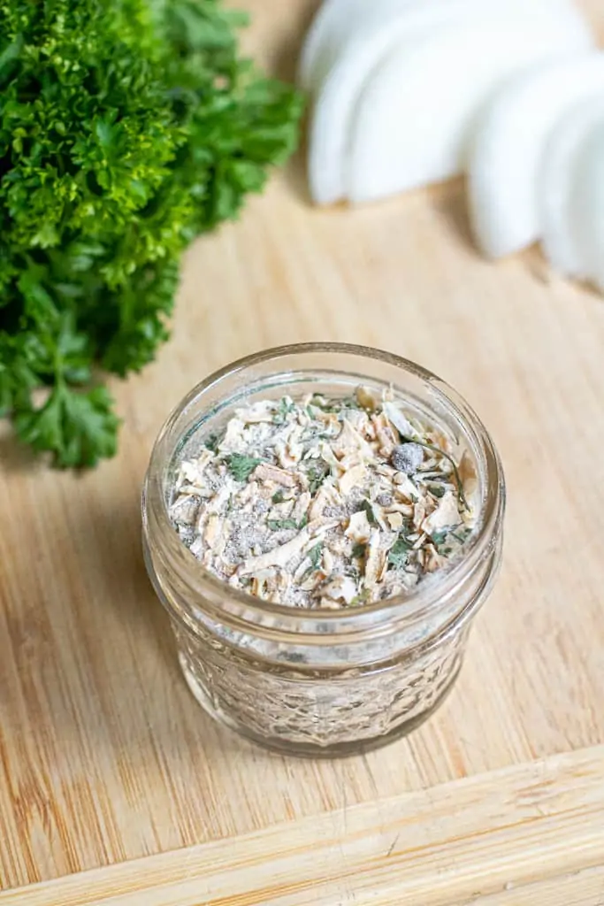 a small open mason jar with onion soup mix.