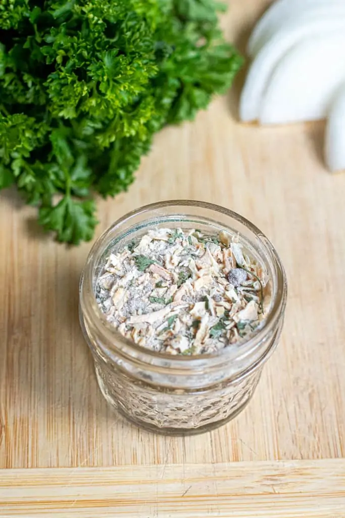 a small open mason jar with onion soup mix.