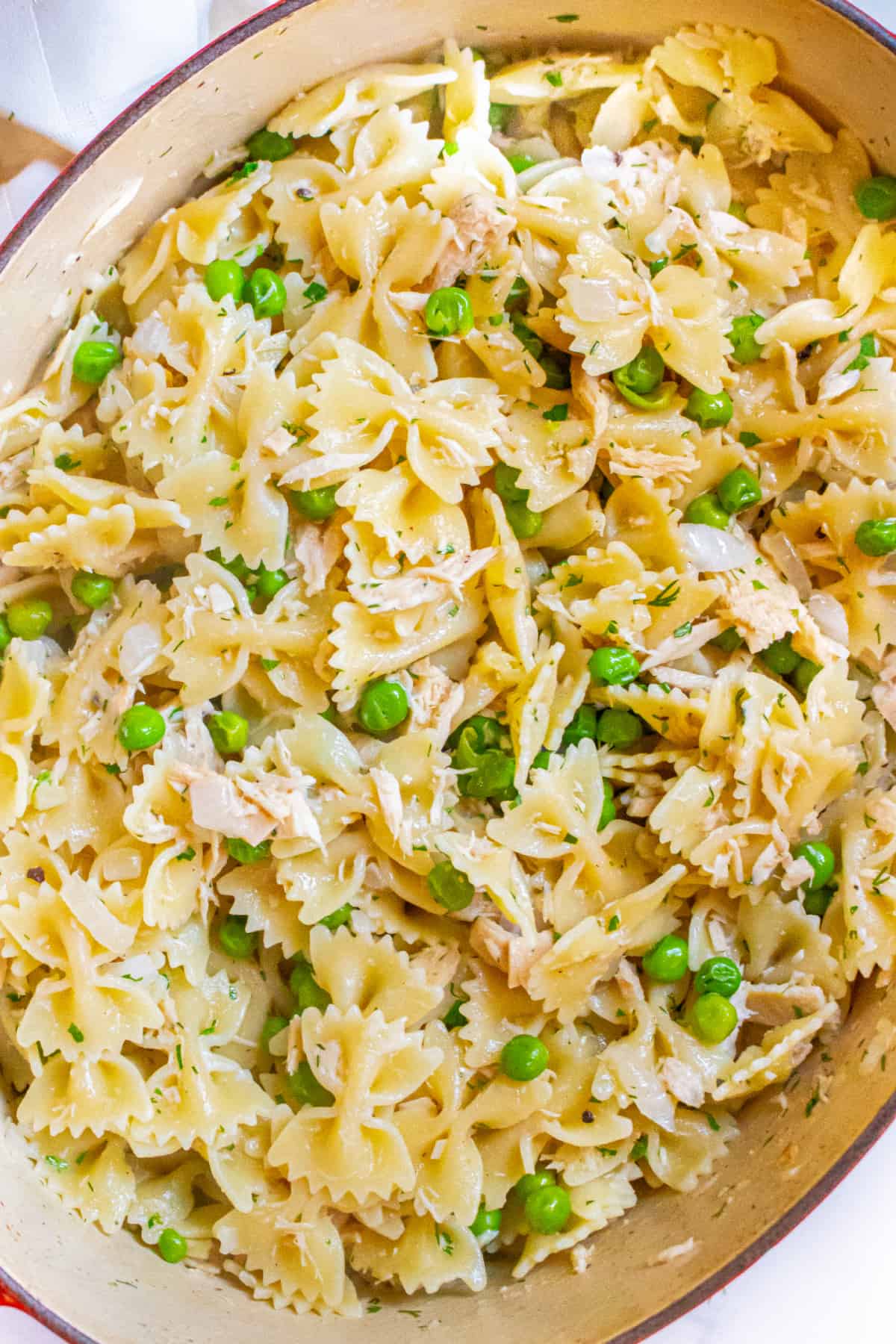 a pot of farfalle tuna pea pasta. 