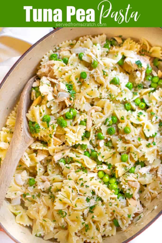 a pot of pasta, peas, and tuna with a wooden spoon and Pinterest pin text.