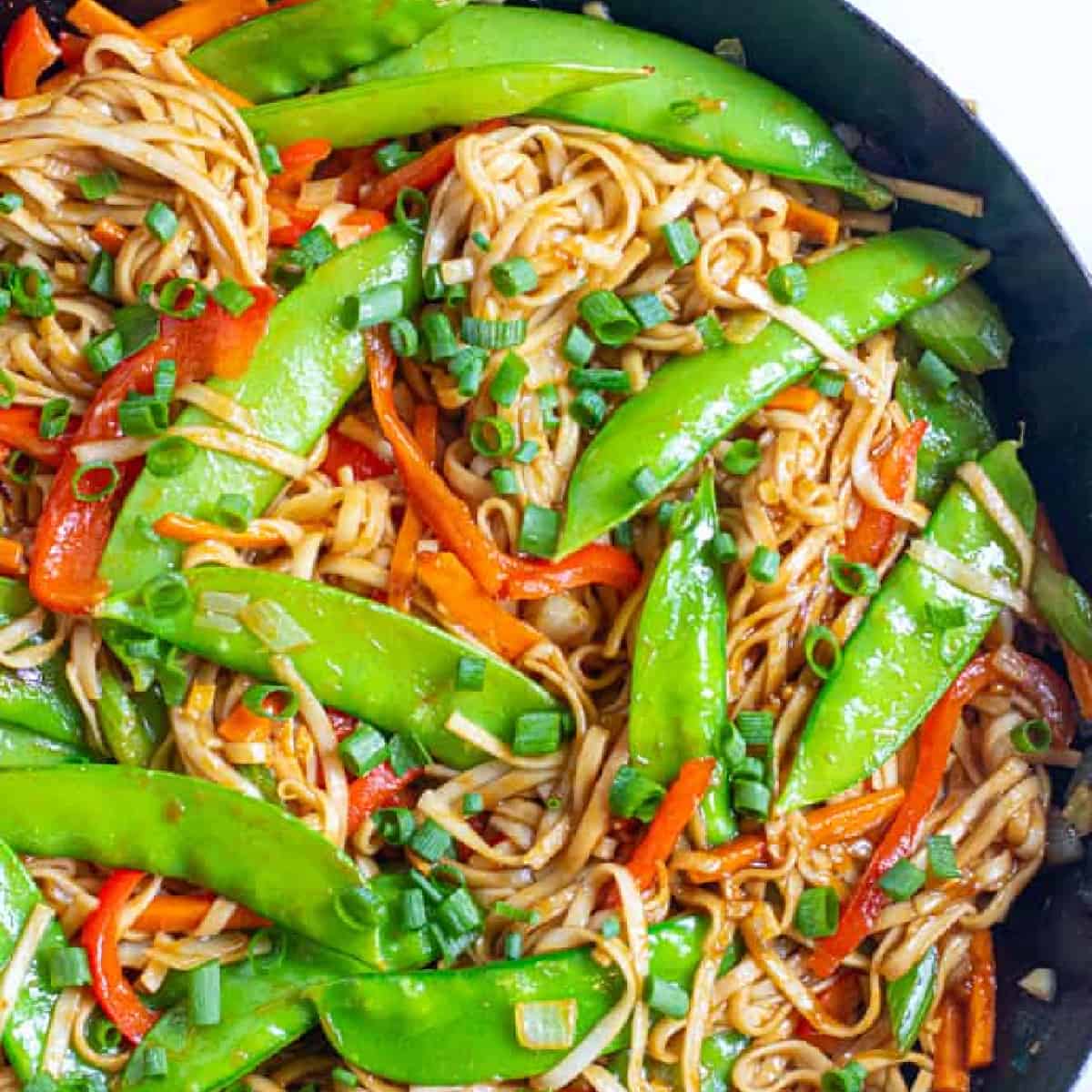 a pan with cooked veggies and noodles.