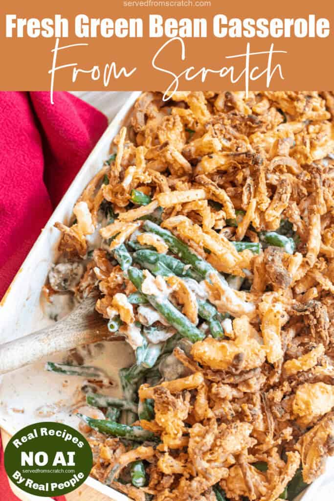 green bean casserole with a spoon scooping some out with Pinterest pin text and NO AI sticker.