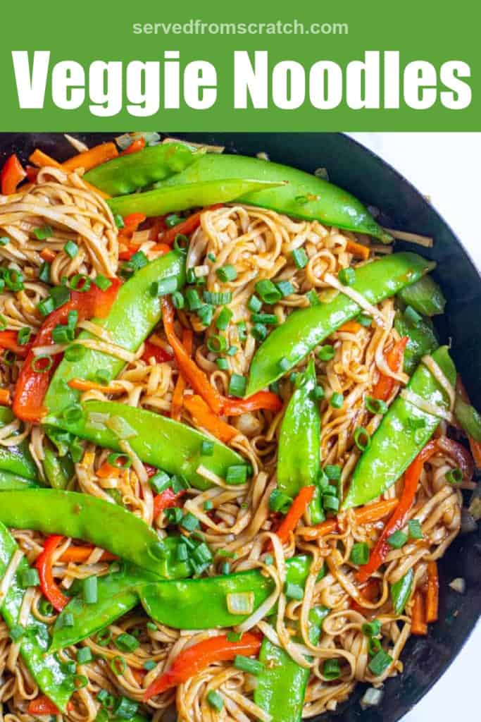 a pan of noodles with veggies and snow peas and Pinterest pin text.