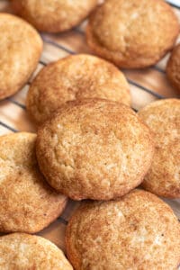 cooling rack of big snickerdoodle cookies.