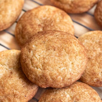 cooling rack of big snickerdoodle cookies.