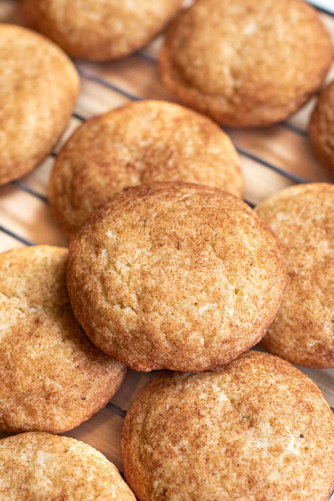 cooling rack of big snickerdoodle cookies.
