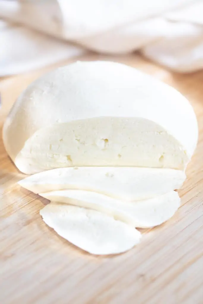 sliced ball of mozzarella cheese.