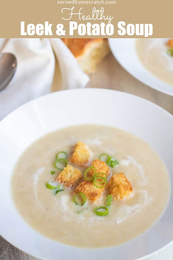 a bowl of leek and potato soup with croutons and green onions with pinterest pin text.