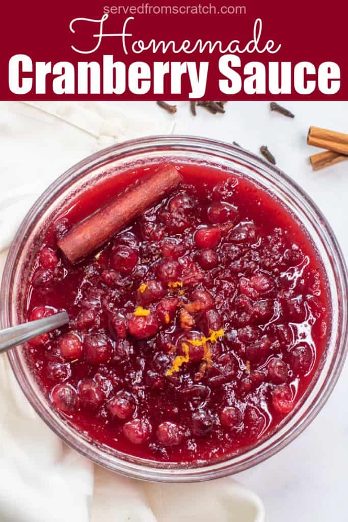 a bowl of homemade cranberry sauce with a spoon with Pinterest pin text.
