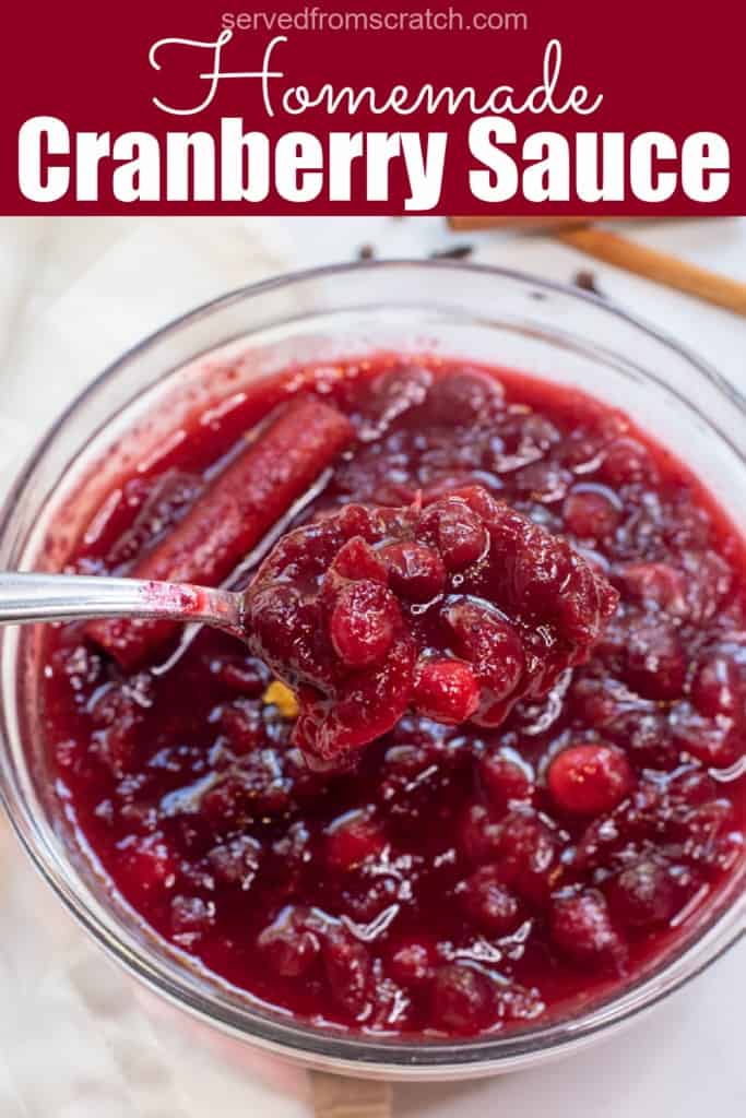 a bowl of homemade cranberry sauce with a spoon with Pinterest pin text.