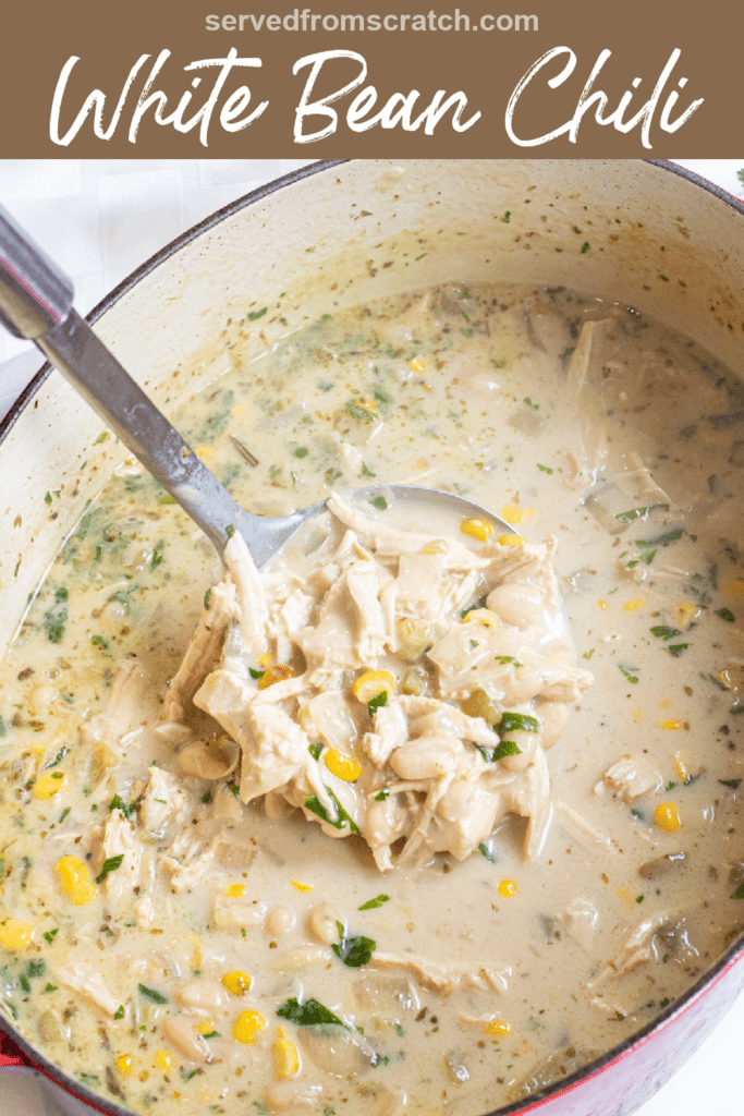 a ladle of creamy white chili soup and Pinterest pin text.