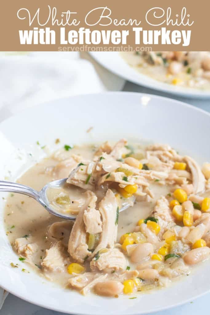 a bowl with a spoon of white chili and Pinterest pin text.