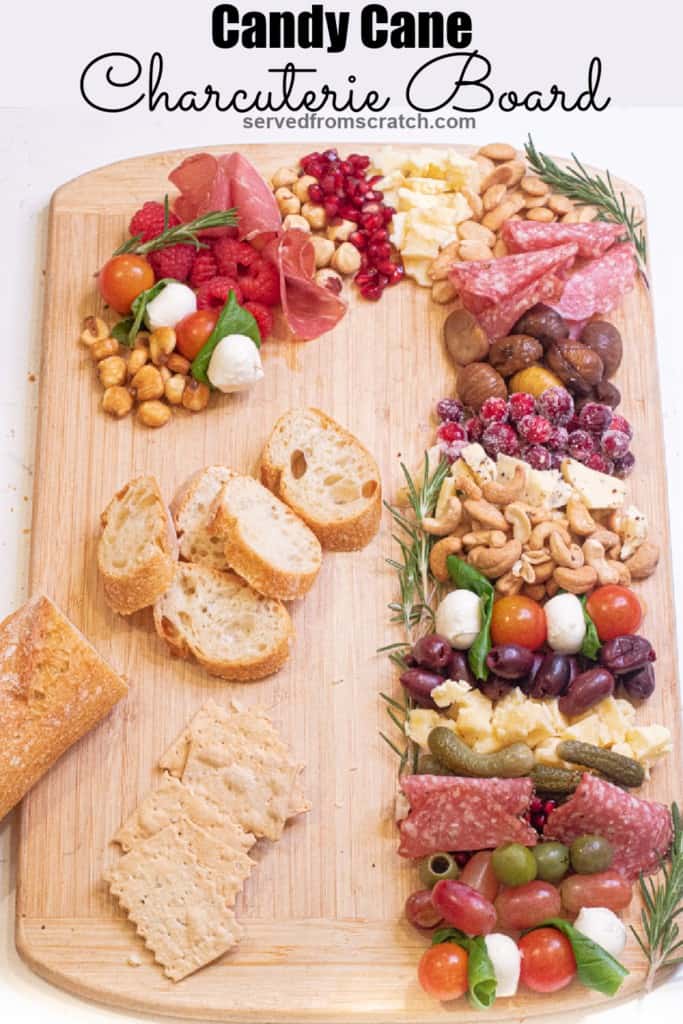 candy cane shaped charcuterie board with Pinterest pin text.