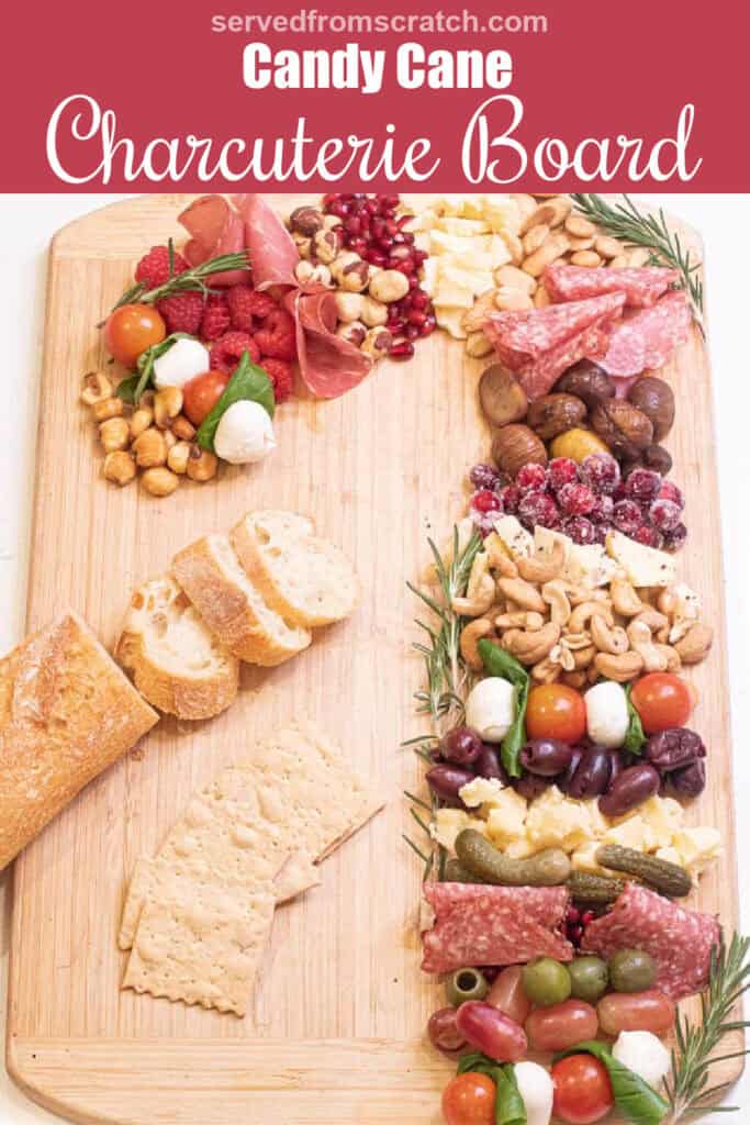 candy cane shaped charcuterie board with Pinterest pin text.