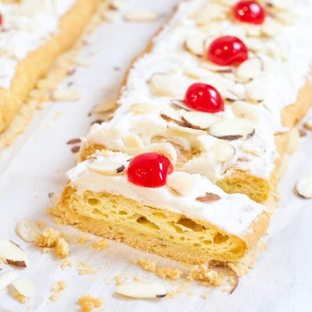 danish puff with a slice cut out.