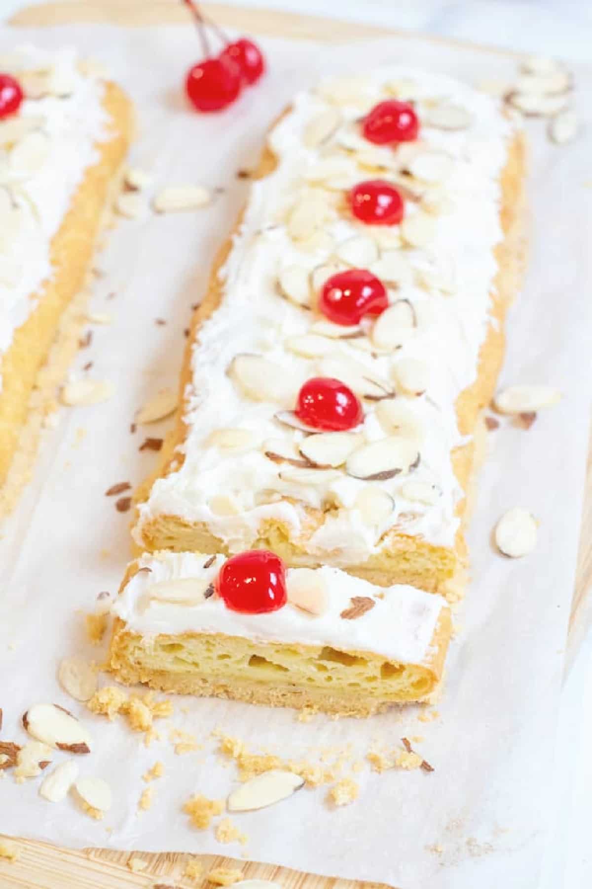 danish puff with a slice cut out.