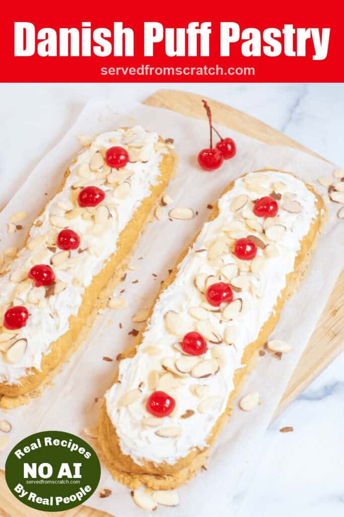 two strips of frosted pastries with sliced almonds and cherries on top with Pinterest pin text and NO AI sticker.