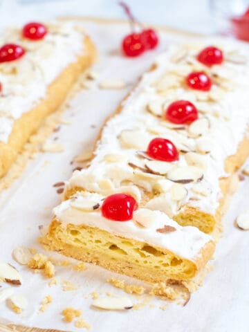 danish puff wiht a slice cut out.