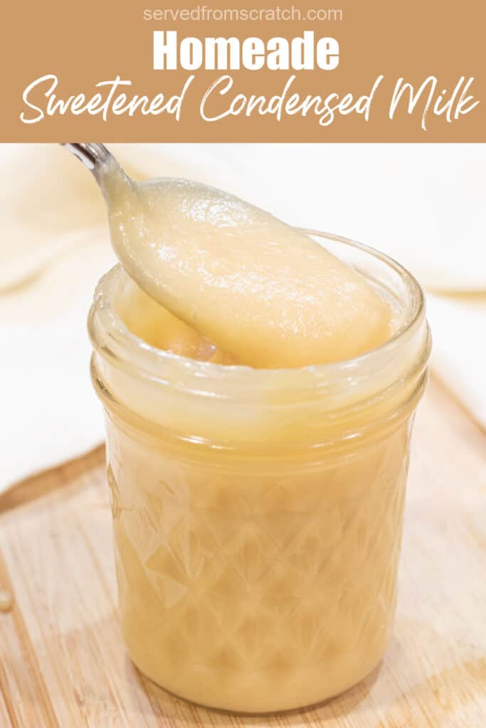 an open mason jar of condensed milk with a spoon with Pinterest pin text.
