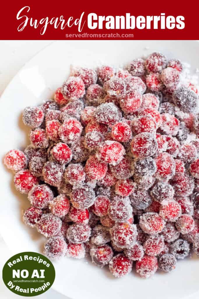 a bowl of sugared cranberries with Pinterest pin text and NO AI sticker.
