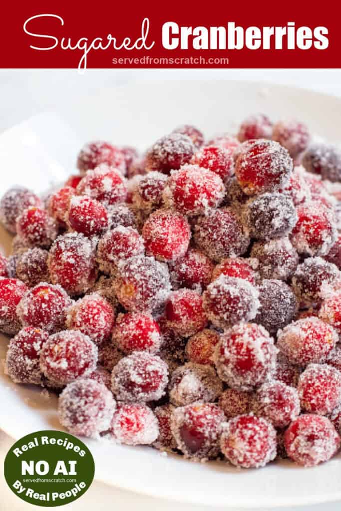 a bowl of sugared cranberries with Pinterest pin text and NO AI sticker.