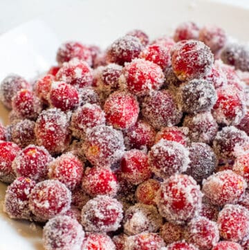 a bowl of sugar coated cranberries.