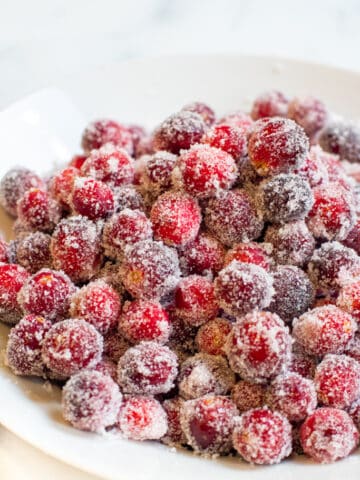 a bowl of sugar coated cranberries.