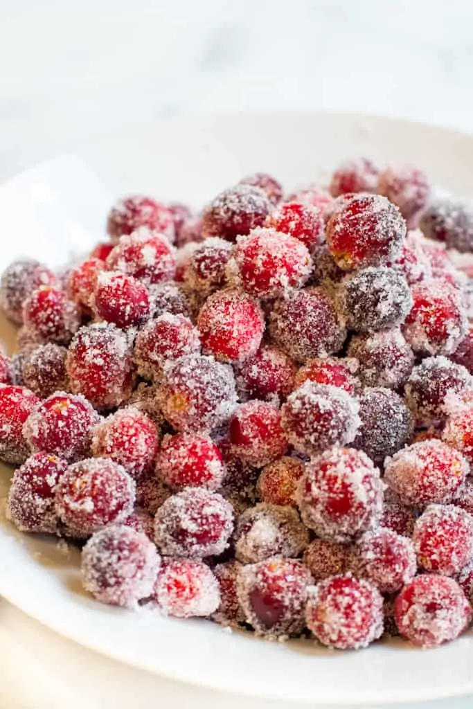 a bowl of sugar coated cranberries.