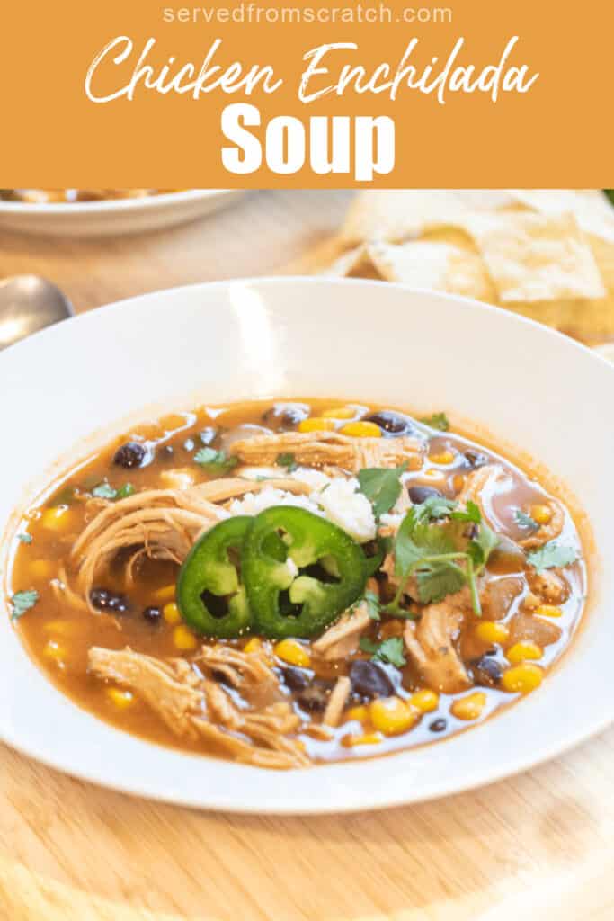 a bowl of chicken soup with jalapenos and cheese and black beans and corn with Pinterest pin text.