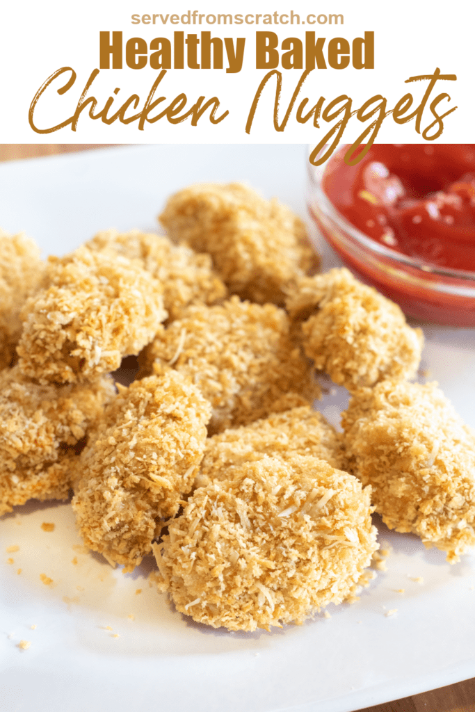 a plate of baked chicken nuggets on a plate next to ketchup with pinterest pin text.