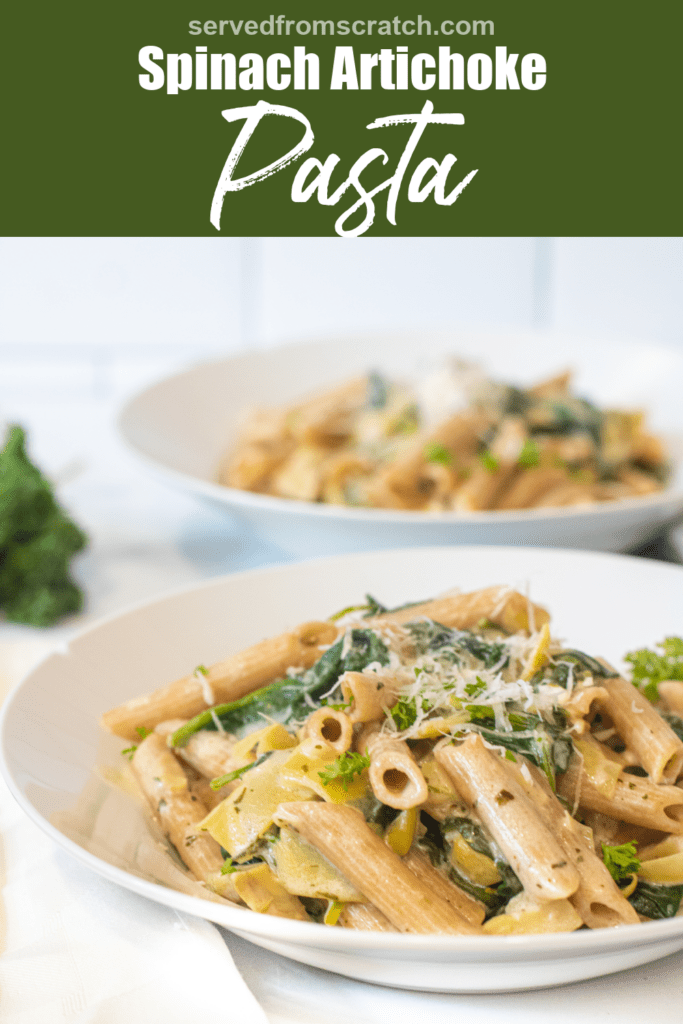 a close up of a bowl of pasta with spinach and artichokes topped with Parmesan cheese with Pinterest pin text.