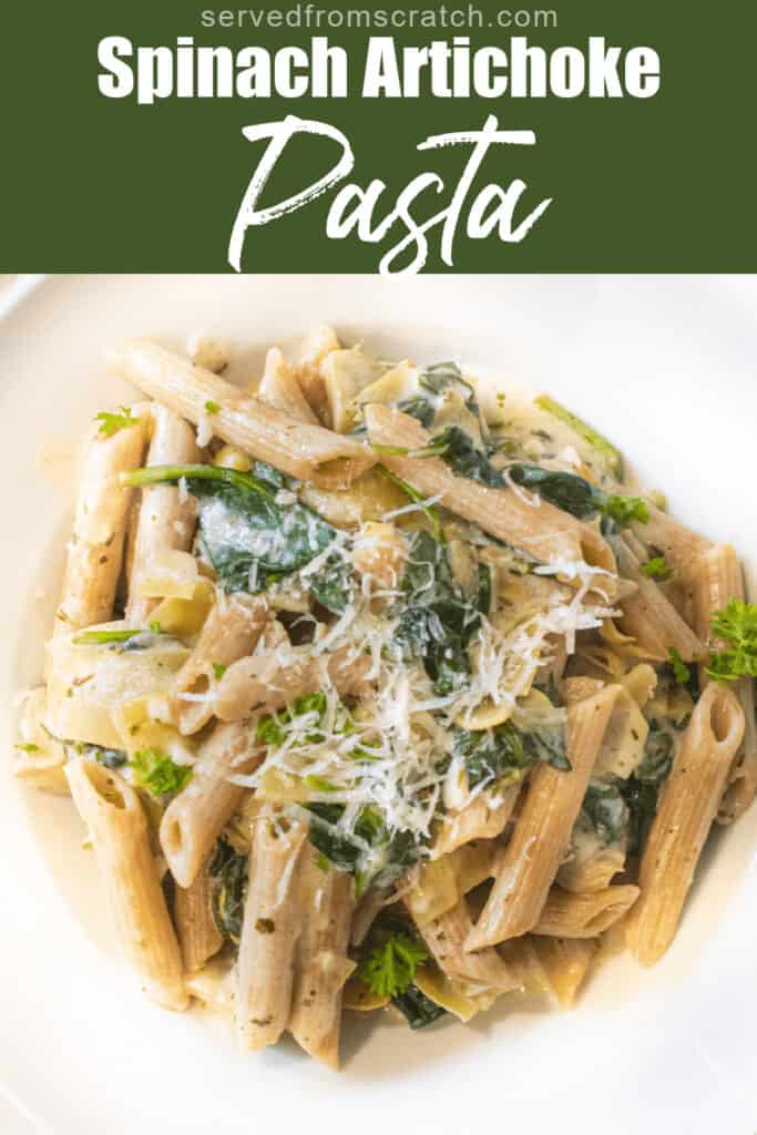 an overhead of a plate of pasta with spinach, artichokes, and cheese with Pinterest pin text.