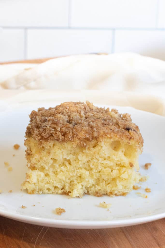 a thick slice of coffee cake on a plate.