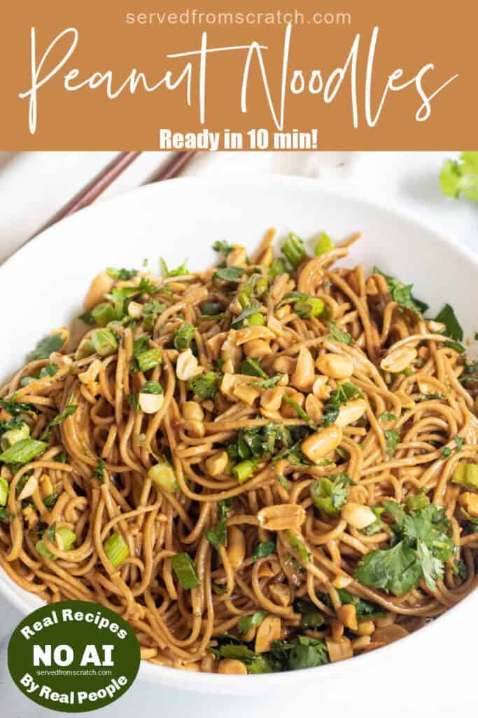 a bowl of soba noodles in a peanut sauce and peanuts and cilantro and green onions with Pinterest pin text and NO AI sticker.