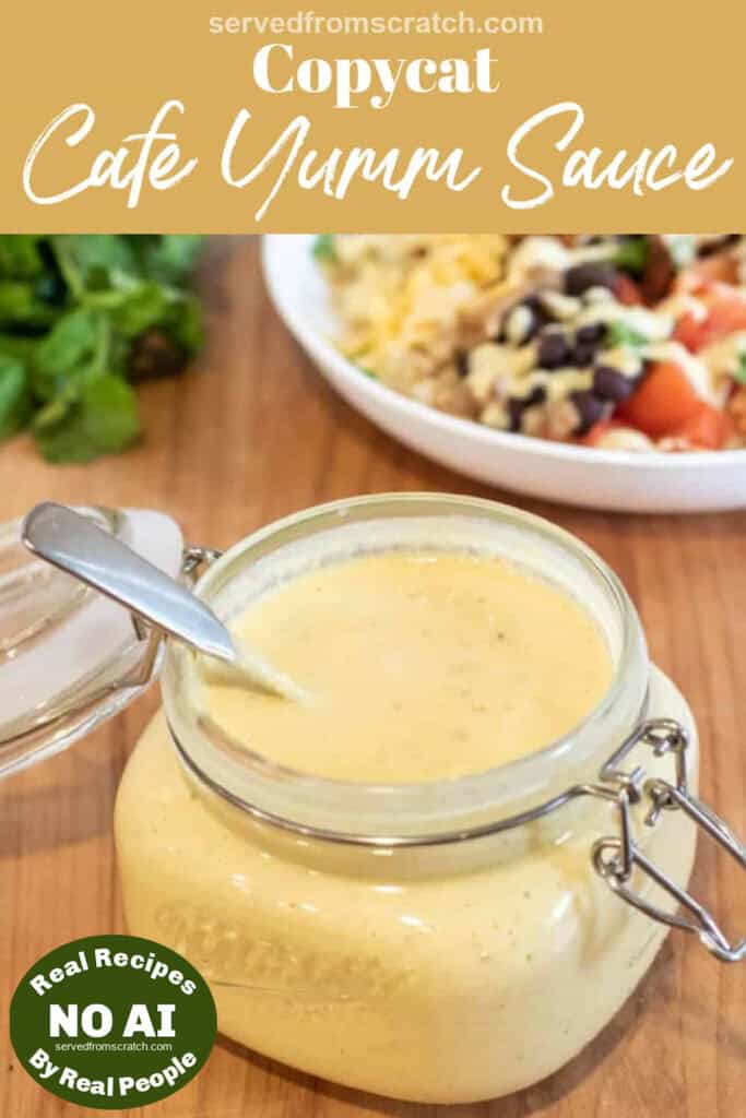 an open jar of sauce with a spoon in it with Pinterest pin text with NO AI sticker.