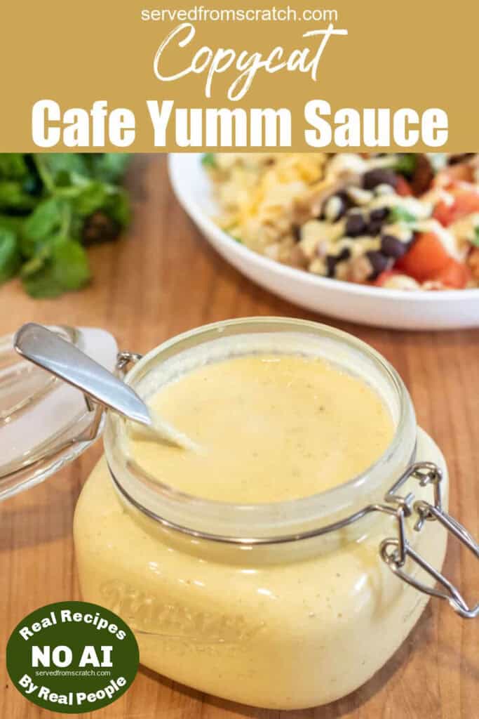 an open jar of sauce with a spoon in it with Pinterest pin text with NO AI sticker.