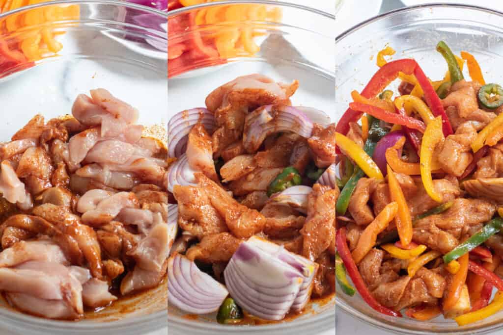 a bowl of raw chicken and spices, mixed with onion and jalapeno, and then sliced colored bell peppers added.