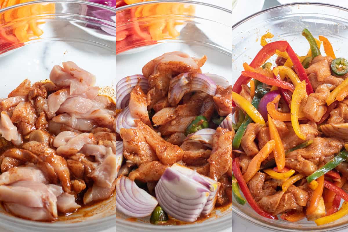 a bowl of raw chicken and spices, mixed with onion and jalapeno, and then sliced colored bell peppers added.