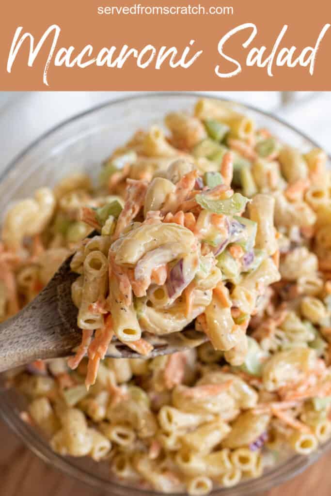 a large bowl of macaroni salad with a spoon with Pinterest pin text.
