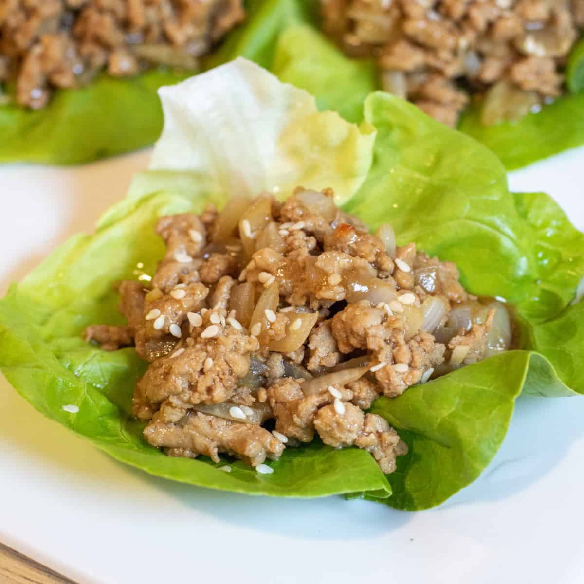 cooked ground turkey in a lettuce wrap.