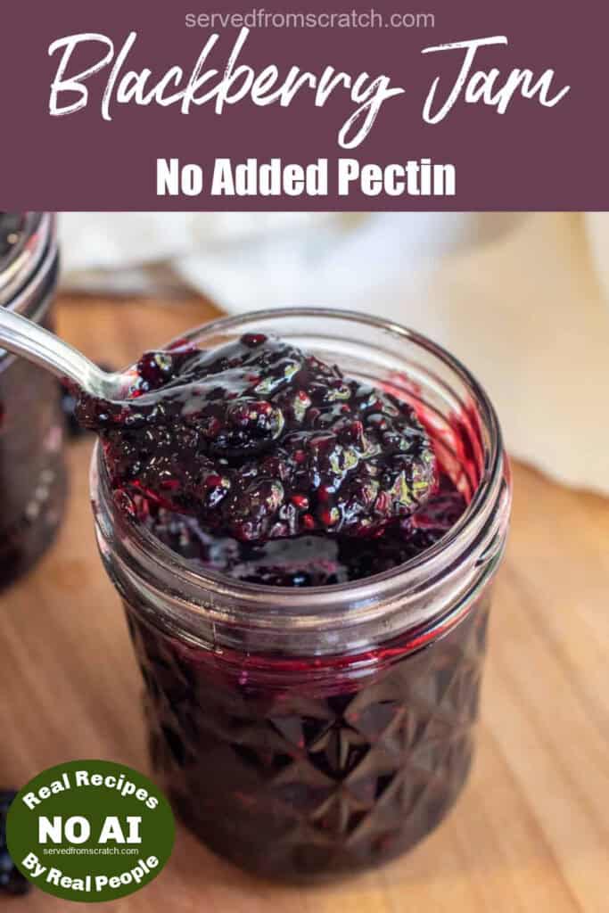 a jar of open blackberry jam with a spoon of jam with Pinterest pin text with NO AI sticker.