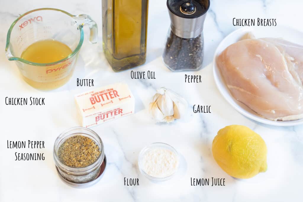 chicken breasts, chicken stock, oil, pepper, butter, garlic, lemon pepper seasoning, flour, and lemon.