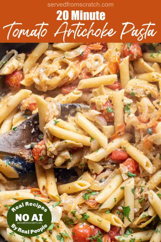 a cast iron of penne pasta with tomatoes and artichokes and parsley with a wooden spoon with PInterest pin text and a NO AI sticker.