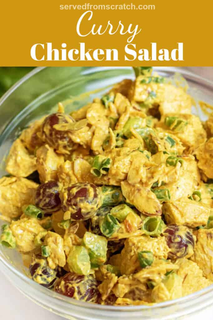 a bowl of curry chicken salad with grapes and green onions with Pinterest pin text.