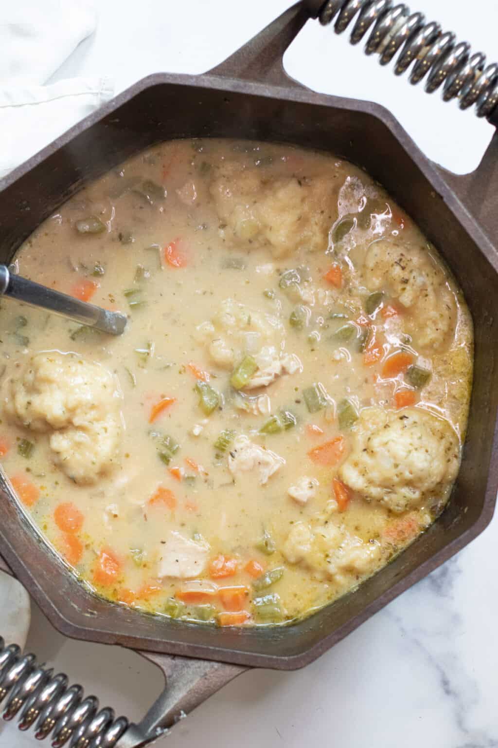 Dutch Oven Chicken and Dumplings Soup Served From Scratch