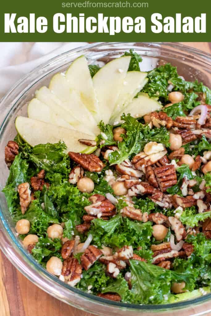 an overhead shot of a kale salad with apples, pecans, and chickpeas with Pinterest pin text.