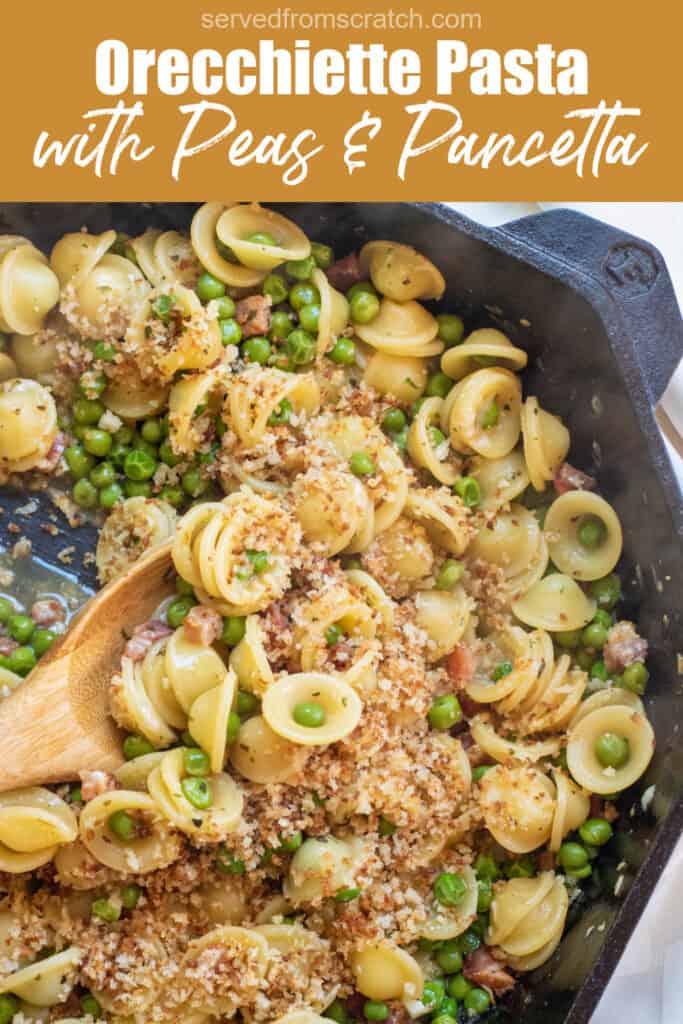 a cast iron with a wooden spoon scooping pasta with peas and pancetta with Pinterest pin text.