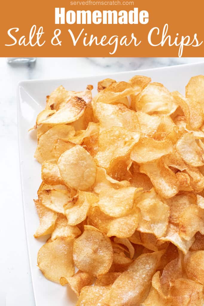 a close up of a plate of crispy homemade potato chips with Pinterest pin text.