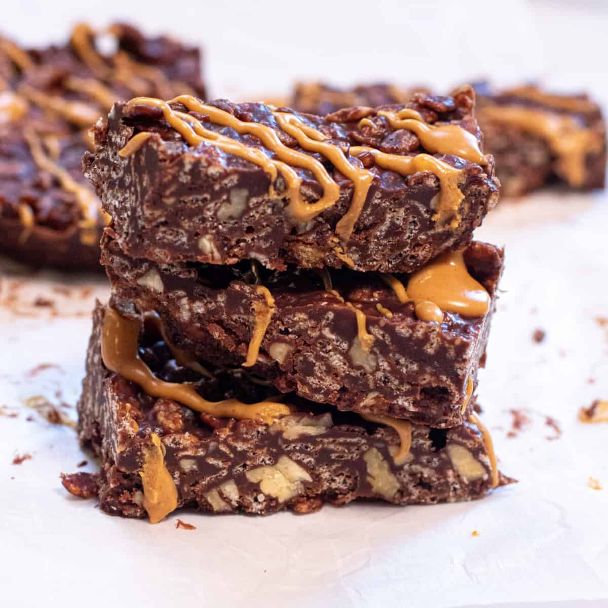 stacked crunch bars with peanut butter drizzle.