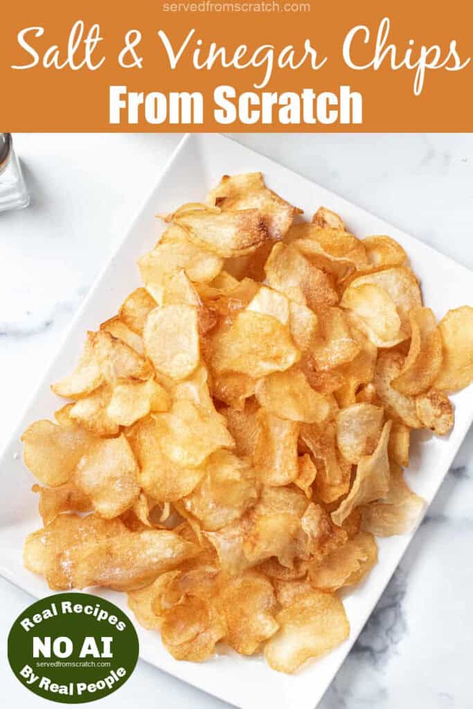 a plate of thin crispy salt and vinegar chips with Pinterest pin text and NO AI sticker.